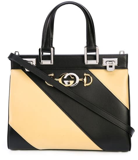 gucci zumi diagonal stripe medium top handle bag|Gucci zumi shoulder bag.